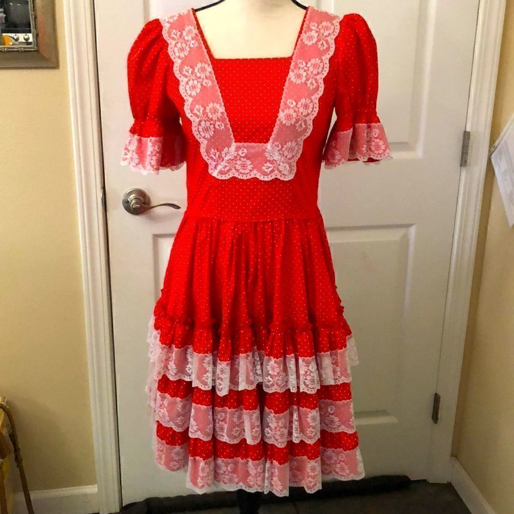 Made especially for you by Marilyn Marshall. Lace ruffles dot dress